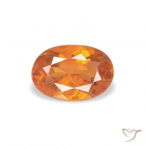 0.57ct Naturel Orange moyen Clinohumite, ovale, SI