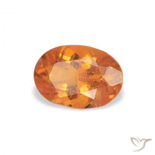 Clinohumite Orange moyen naturelle ovale, 0.75 ct, SI