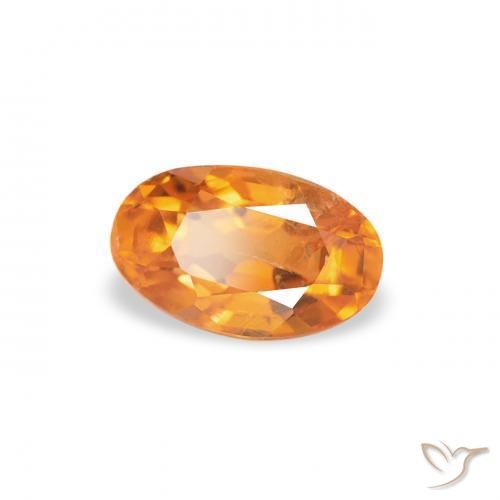 Clinohumite Ambre orange naturelle ovale, 0.40 ct, SI