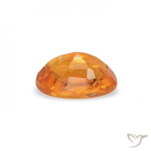 Clinohumite Ambre orange naturelle ovale, 0.40 ct, SI