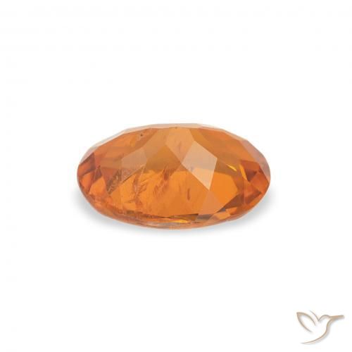 Clinohumite Orange moyen naturelle ovale, 0.70 ct, SI