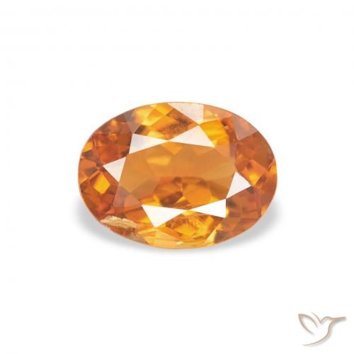 0.70ct Naturel Abricot orange Clinohumite, ovale, SI