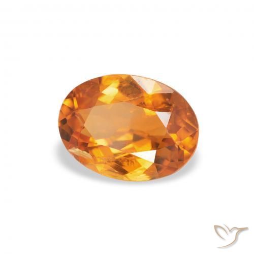 Clinohumite Abricot orange naturelle ovale, 0.70 ct, SI
