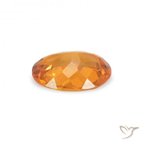 Clinohumite Abricot orange naturelle ovale, 0.70 ct, SI
