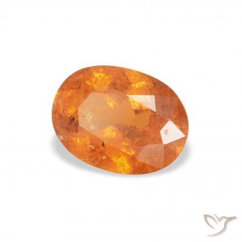 Clinohumite Orange moyen naturelle ovale, 1.17 ct, SI