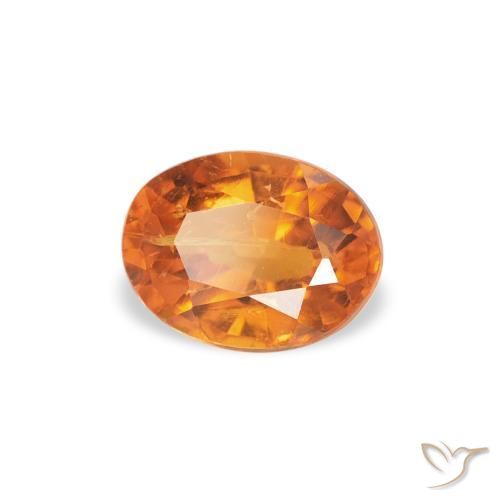 Clinohumite Orange moyen naturelle ovale, 0.66 ct, SI