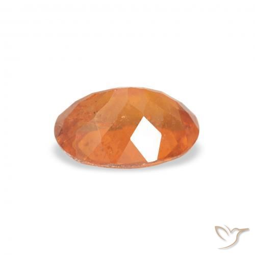 Clinohumite Orange foncé naturelle ovale, 0.87 ct, SI