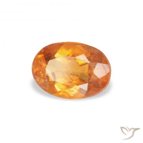 Clinohumite Orange rougeâtre naturelle ovale, 0.76 ct, SI