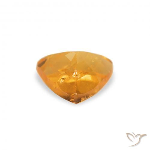 Clinohumite Orange moyen naturelle Trillion, 0.78 ct, SI