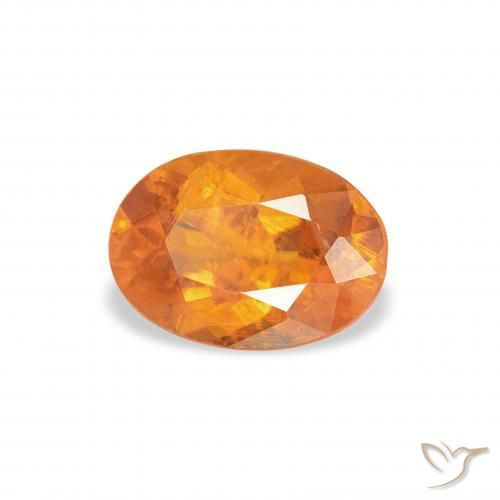 Clinohumite Orange moyen naturelle ovale, 0.85 ct, SI