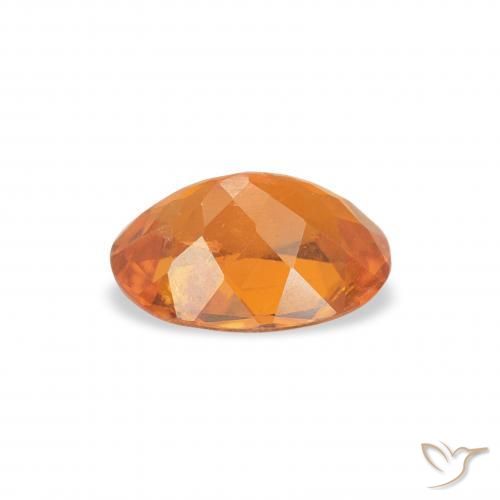Clinohumite Orange moyen naturelle ovale, 0.85 ct, SI