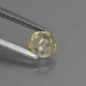 Diaspore à changement de couleur de couleur changeante naturelle coupe roude, 0,59 ct, VS-SI