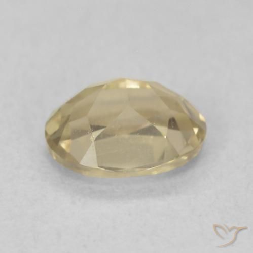 Diaspore Couleur Changeant Jaune chaud naturelle ovale, 0.66 ct, VVS-VS