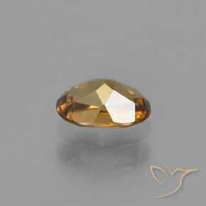 Grenat à changement de couleur doré naturelle coupe ovale, 0,72 ct, VVS-VS