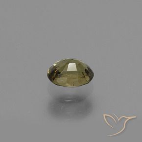 Grenat à changement de couleur jaune naturelle coupe ovale, 0,65 ct, VS
