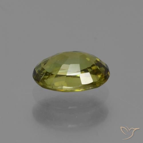 Grenat démantoïde Vert moyen naturelle ovale, 0.61 ct, VS