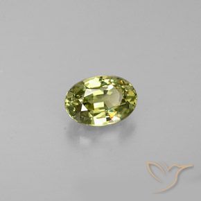Grenat démantoïde Jaune moyen naturelle ovale, 0.57 ct, VS
