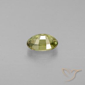 Grenat démantoïde Jaune moyen naturelle ovale, 0.57 ct, VS