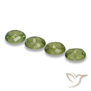 Shop natural 1.25ct Vert clair Grenat démantoïde gems, ovale, from Namibie at GemSelect. In stock, global shipping!