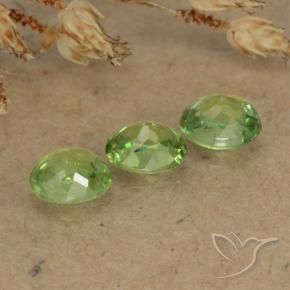Shop natural 0.86ct Vert jaunâtre Grenat démantoïde gems, ovale, from Namibie at GemSelect. In stock, global shipping!