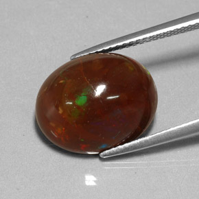 Opale de feu multicolore naturelle coupe ovale, 6,48 ct, opaque