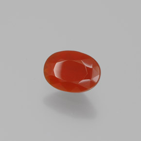 Opale de feu Orange rougeâtre naturelle Coupe ovale, 0.54 ct, Transparent