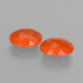 Achetez naturel 1.39ct Orange rouge foncé Opale de feu gems, Coupe ovale, En provenance Mexique chez GemSelect. En stock, livraison internationale!
