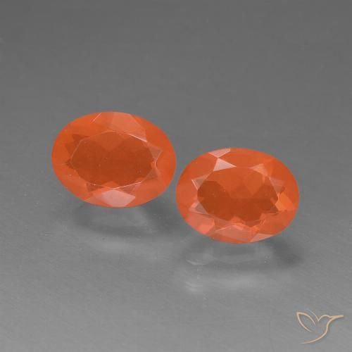 Achetez naturel 1.36ct Orange vif Opale de feu gems, Coupe ovale, En provenance Mexique chez GemSelect. En stock, livraison internationale!