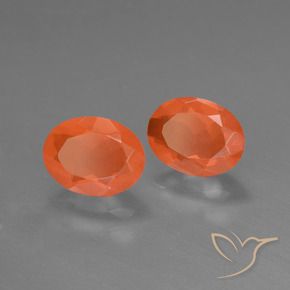 Achetez naturel 1.36ct Orange vif Opale de feu gems, Coupe ovale, En provenance Mexique chez GemSelect. En stock, livraison internationale!