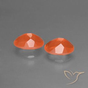 Achetez naturel 1.36ct Orange vif Opale de feu gems, Coupe ovale, En provenance Mexique chez GemSelect. En stock, livraison internationale!