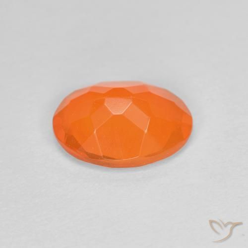 Opale de feu Orange moyen naturelle ovale, 0.63 ct, Transparent