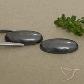 Shop natural 18.34ct Noir Gris Hématite gems, ovale, from Brésil at GemSelect. In stock, global shipping!
