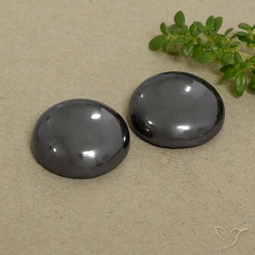 Achetez naturel 30.80ct Gris moyen Hématite gems, Coupe roude, En provenance Brésil chez GemSelect. En stock, livraison internationale!