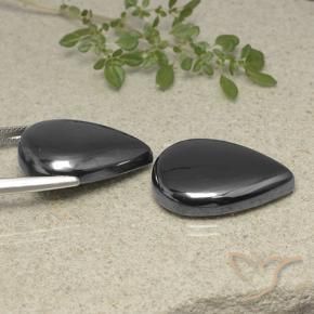 Shop natural 60.51ct Noir Gris Hématite gems, En forme de poire, from Brésil at GemSelect. In stock, global shipping!
