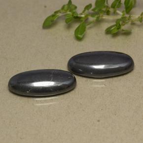 Achetez naturel 18.81ct Noir Gris Hématite gems, Coupe ovale, En provenance Brésil chez GemSelect. En stock, livraison internationale!