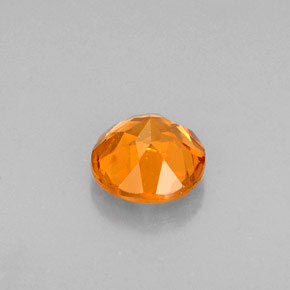 Grenat Hessonite Orange naturelle Coupe roude, 0.65 ct, VS