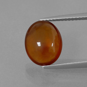 Grenat hessonite orange naturelle coupe ovale, 4,85 ct, transparent