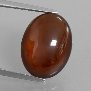 Grenat hessonite orange naturelle coupe ovale, 9,81 ct, translucide