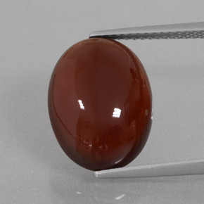 Grenat hessonite orange naturelle coupe ovale, 9,76 ct, translucide