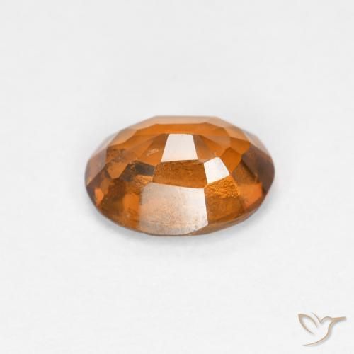 Grenat Hessonite Orange jaunâtre naturelle ovale, 0.78 ct, VS