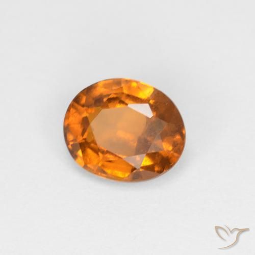 Grenat Hessonite Orange brunâtre naturelle ovale, 0.94 ct, VS