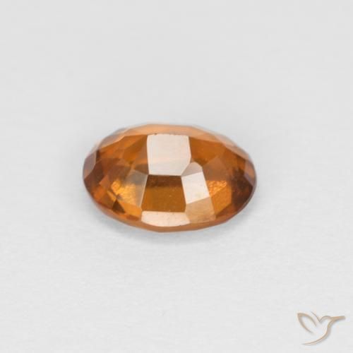 Grenat Hessonite Orange brunâtre naturelle ovale, 0.94 ct, VS