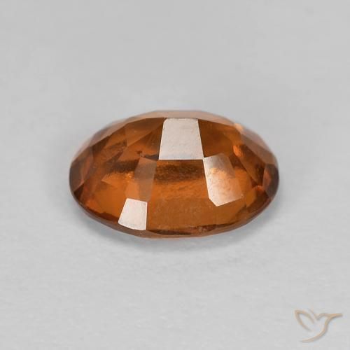 Grenat Hessonite Orange rougeâtre naturelle ovale, 1.21 ct, VS