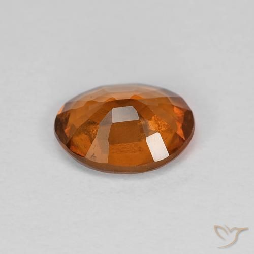 Grenat Hessonite Ambre orange naturelle ovale, 0.91 ct, VS