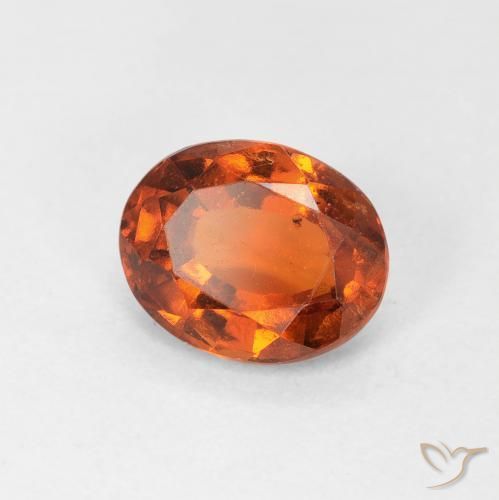 Grenat Hessonite Orange rougeâtre naturelle ovale, 1.29 ct, VS