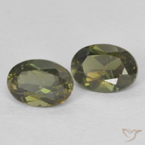 Shop natural 0.50ct Vert brunâtre Rupine des grains gems, ovale, from Sri Lanka at GemSelect. In stock, global shipping!
