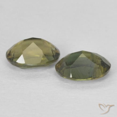 Shop natural 0.50ct Vert brunâtre Rupine des grains gems, ovale, from Sri Lanka at GemSelect. In stock, global shipping!
