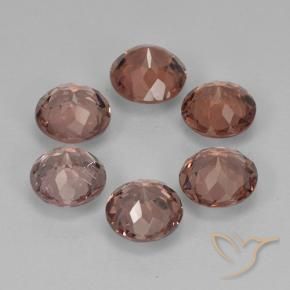 Shop natural 3.88ct Rouge moyen Grenat Malaya gems, Tour, from Tanzanie at GemSelect. In stock, global shipping!