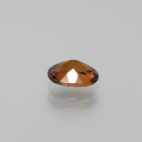 Petit Grenat Brun orangé naturelle Coupe ovale, 0.87 ct, VVS