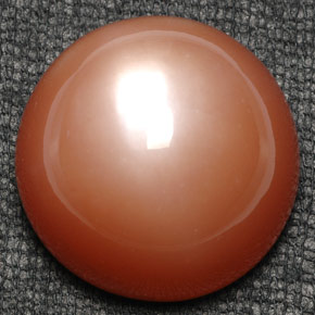 Pierre de lune orange naturelle coupe roude, 52,80 ct, opaque